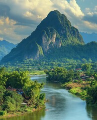 Lush Green Valley with River and Mountain under Partly Cloudy Sky