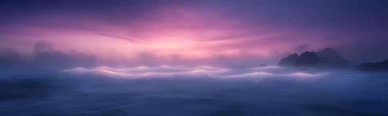 Fototapeta premium Misty landscape at dawn with vibrant purple and pink hues illuminating the sky.