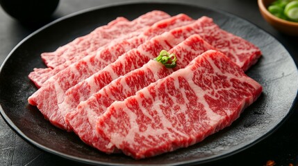 Premium Wagyu Beef Slices. Raw Meat On A Black Plate, Prepared For Grilling Or Cooking.