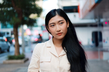 Portrait actractive  Asian woman the city.