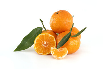 Fresh Juicy Tangerines With Leaves and Sliced Segments on White Background