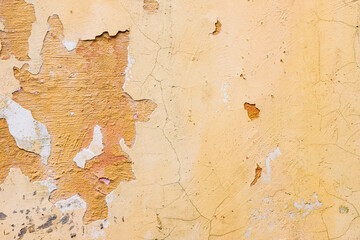 Damaged plaster on an old wall.