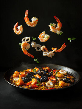 Delicious Seafood Paella with Flying Shrimp