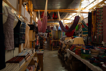 Obraz premium Colorful artisan shop with hammocks and crafts in Guatemala