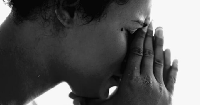 Intense Young African American in Mental Illness Struggle &ndash; Dramatic Monochromatic, Quiet Despair of 20s Girl Covering Face suffering from depression