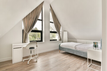 A stylish modern bedroom showcases minimalist design with large windows, elegant curtains, and a simple bed. The flooring adds warmth to the serene ambiance.