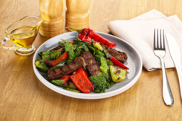 Salad with grilled beef steak