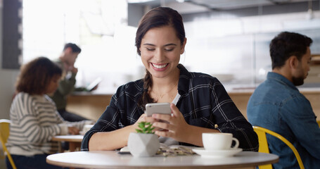 Smile, internet and woman in restaurant, smartphone and typing with social media, herbal tea and relax. Person, connection and girl in cafe, coffee or cellphone with digital app or message to contact