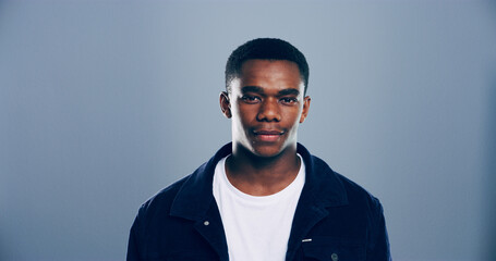 Portrait, space and student with black man in studio for development, education or learning. College, scholarship and university with African person on gray background mockup for back to school