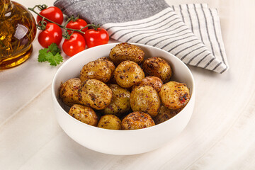 Baked mini potato with herbs