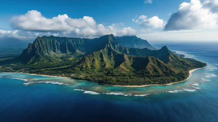 Fototapeta premium Aerial view of lush mountainous island with coastal beach and ocean