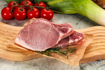 Raw pork steak loin with bone