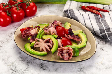 Salad with baby octopus and avocado
