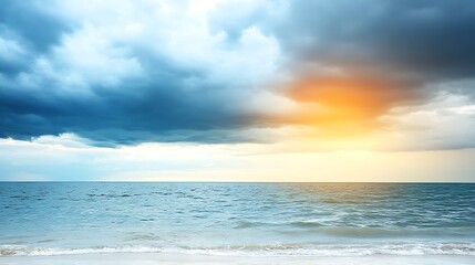 Obraz premium Dramatic sunset over calm ocean.