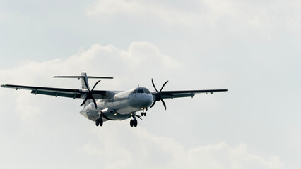 The plane lands at dusk or dawn