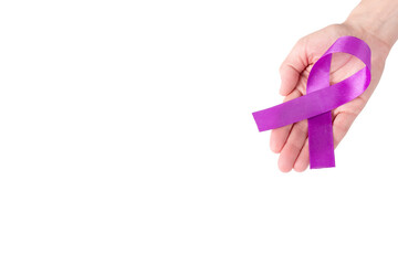 Purple satin ribbon on the palm of a woman, isolated on a white background. Cancer awareness symbol, epilepsy. copy space.