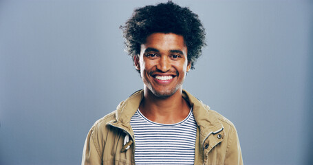 Fashion, studio and portrait of man, excited and happy for scholarship in university, trendy and...