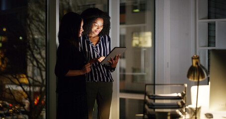 Smile, business people and women with tablet in office, research information and deadline for news. Night, teamwork and journalists with digital for article post, newsletter website and review story