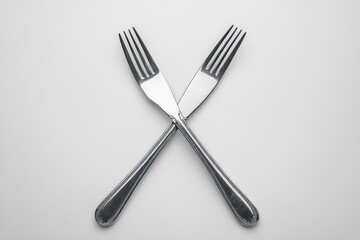 crossed forks elegance culinary cutlery flatware metallic minimalism silverware arrangement