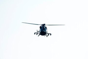 helicopter is flying on isolated white background