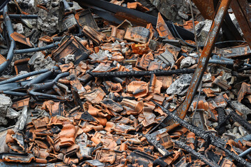 The debris from the roof of a building that fell and was destroyed, the debris consisted of tiles,...