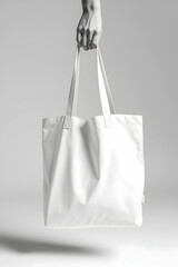 A woman is holding a colorful paper shopping bag in her hand after a retail purchase