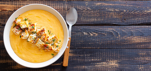 Cheese cream soup with croutons. Healthy food. Vegetarian food.