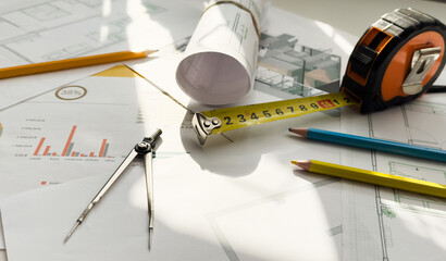 Housing blueprint working desk of architect engineer, only object shot.