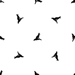 Seamless pattern of repeated black fox symbols. Elements are evenly spaced and some are rotated. Illustration on transparent background