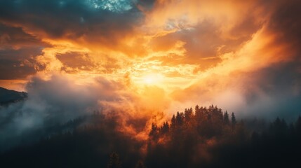 Obraz premium Golden light breaks through the dark clouds at sunset over a mountain range.