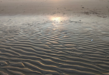 The beach after the tide recedes in the evening