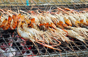 Grilled shrimp on a charcoal grill