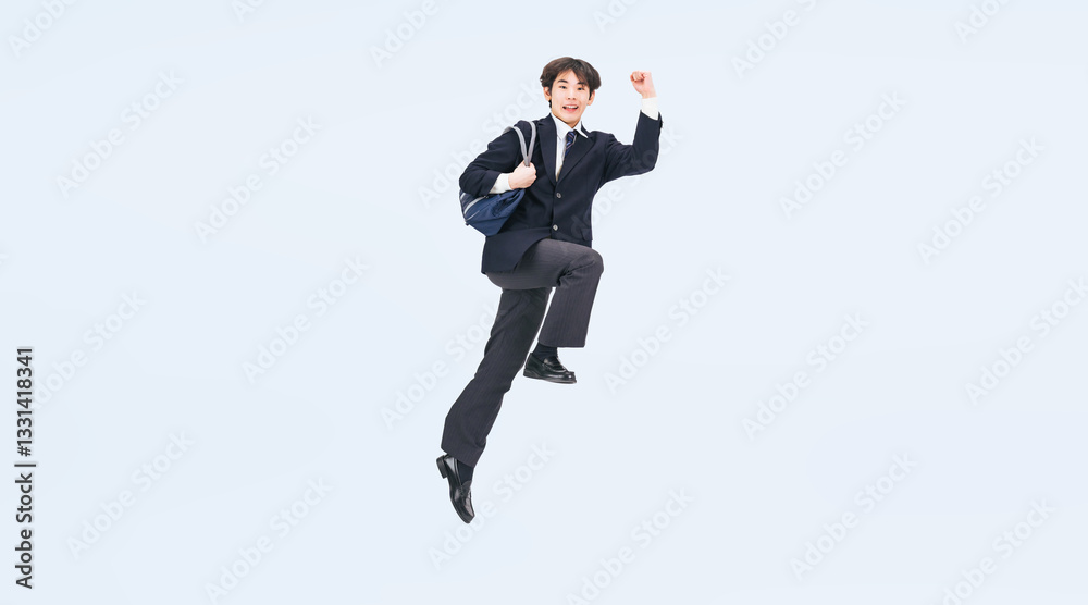 Poster ジャンプする制服を着た男子学生の全身写真（切り抜き背景透過pngも販売しております。↓作成者リンクから「png」で検索してください）
