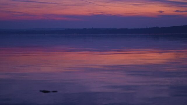 Evening dawn at Bavarian lake Ammersee on cold winter day