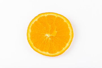 Fresh orange slice isolated on white background. Vibrant citrus fruit, rich in vitamin C, ideal for healthy eating, freshness and nutrition concepts. Copy space. Vitality and wellness concept