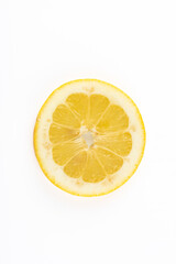 Top view of lemon slice isolated on white background. Copy space. Concept of fruit, healthy eating and freshness