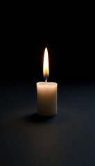 Single Candle in Dark Room