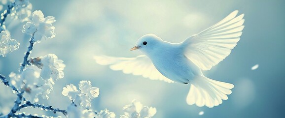 Fototapeta premium White bird in flight near blooming flowers.