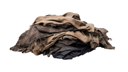 Old, worn fabrics piled together showing signs of heavy use and natural wear over time in a neutral setting