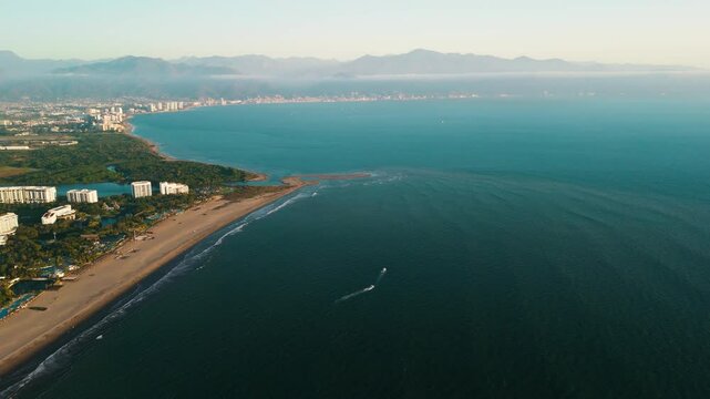 View of the vast pacific ocean in banderas bay at sunset, mexico