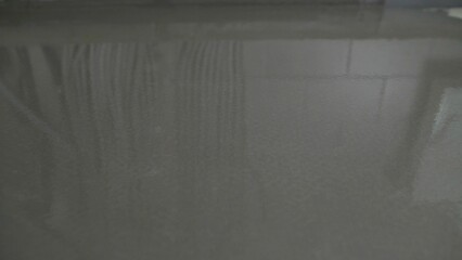 Wet cement floor drying process