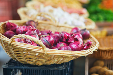 Fresh organic onion on farmers market in Paris, France.