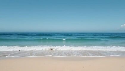 Serene Ocean View with Clear Blue Sky and Sandy Beach

