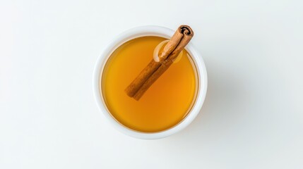 Warm Cinnamon Drink in a White Cup on White Background