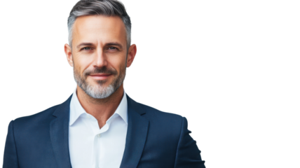 Confident man in a suit smiling warmly against a clean background in a professional setting