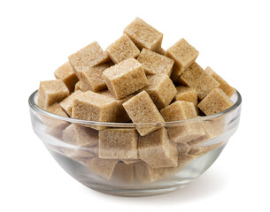 Brown sugar cubes in glass plate close-up on a white background. Isolated