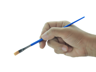 Female hand holding Paintbrush isolated on white background.