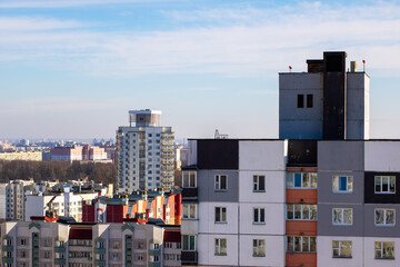 A picturesque cityscape featuring several buildings in the foreground
