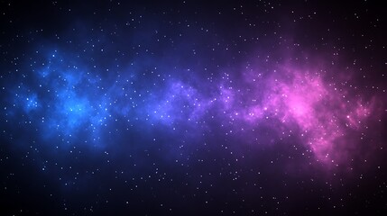 Obraz premium A cosmic scene with a nebula and scattered shining stars