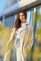 Young arab muslim woman walking confidently in urban setting